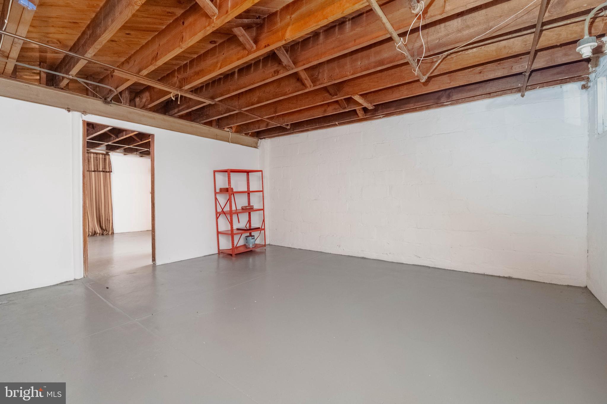1325 Crofton Road Baltimore, MD 21239 - Photo 19 of 25 a view of a room with wooden walls and roof