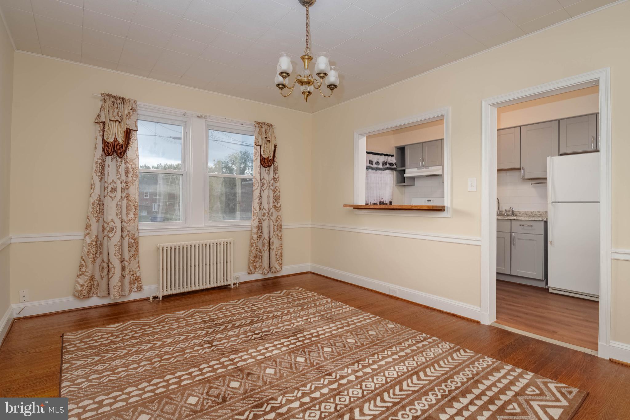 1325 Crofton Road Baltimore, MD 21239 - Photo 4 of 25 a view of a room with window and stairs