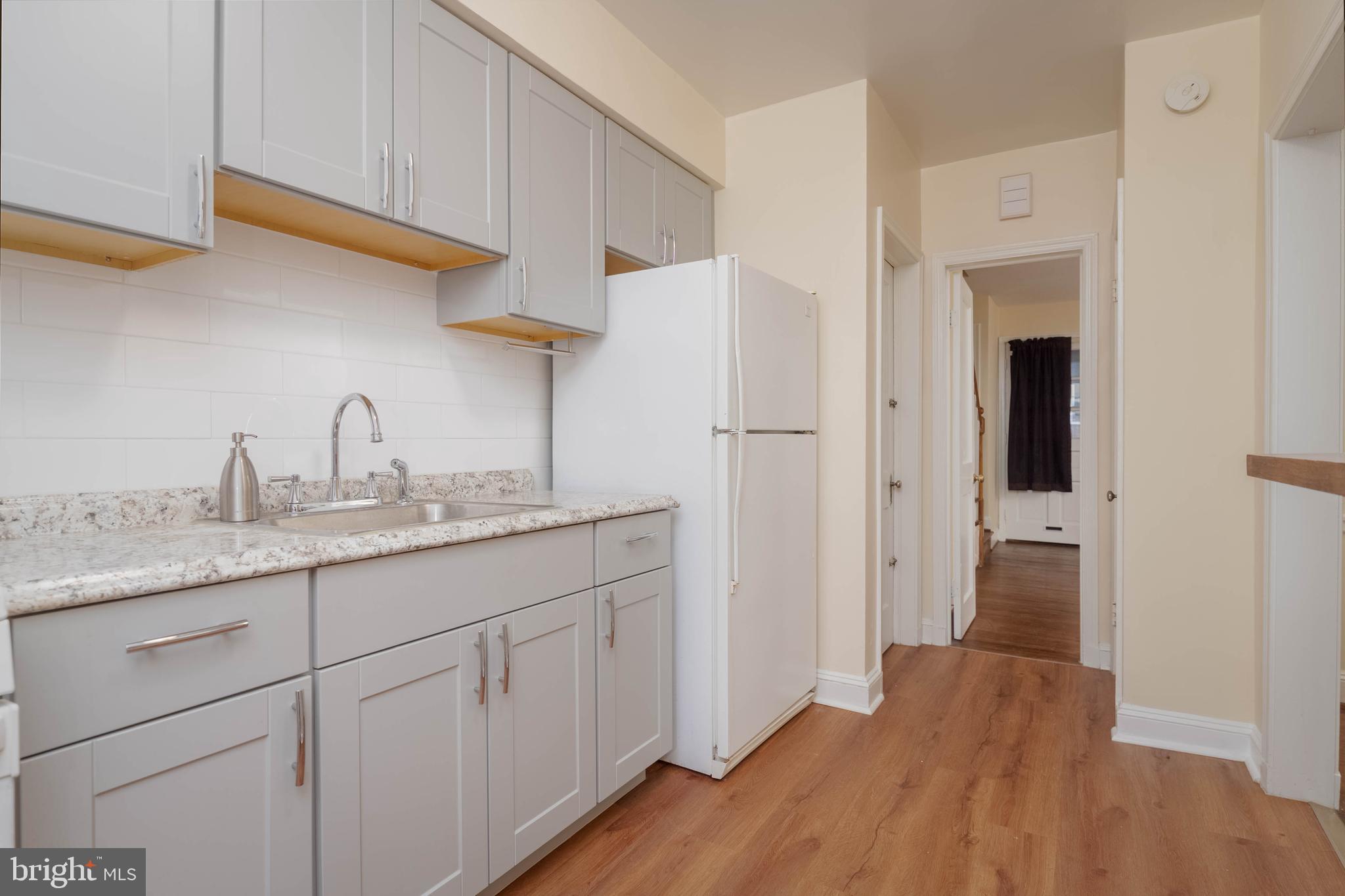 1325 Crofton Road Baltimore, MD 21239 - Photo 8 of 25 a kitchen with sink and cabinets