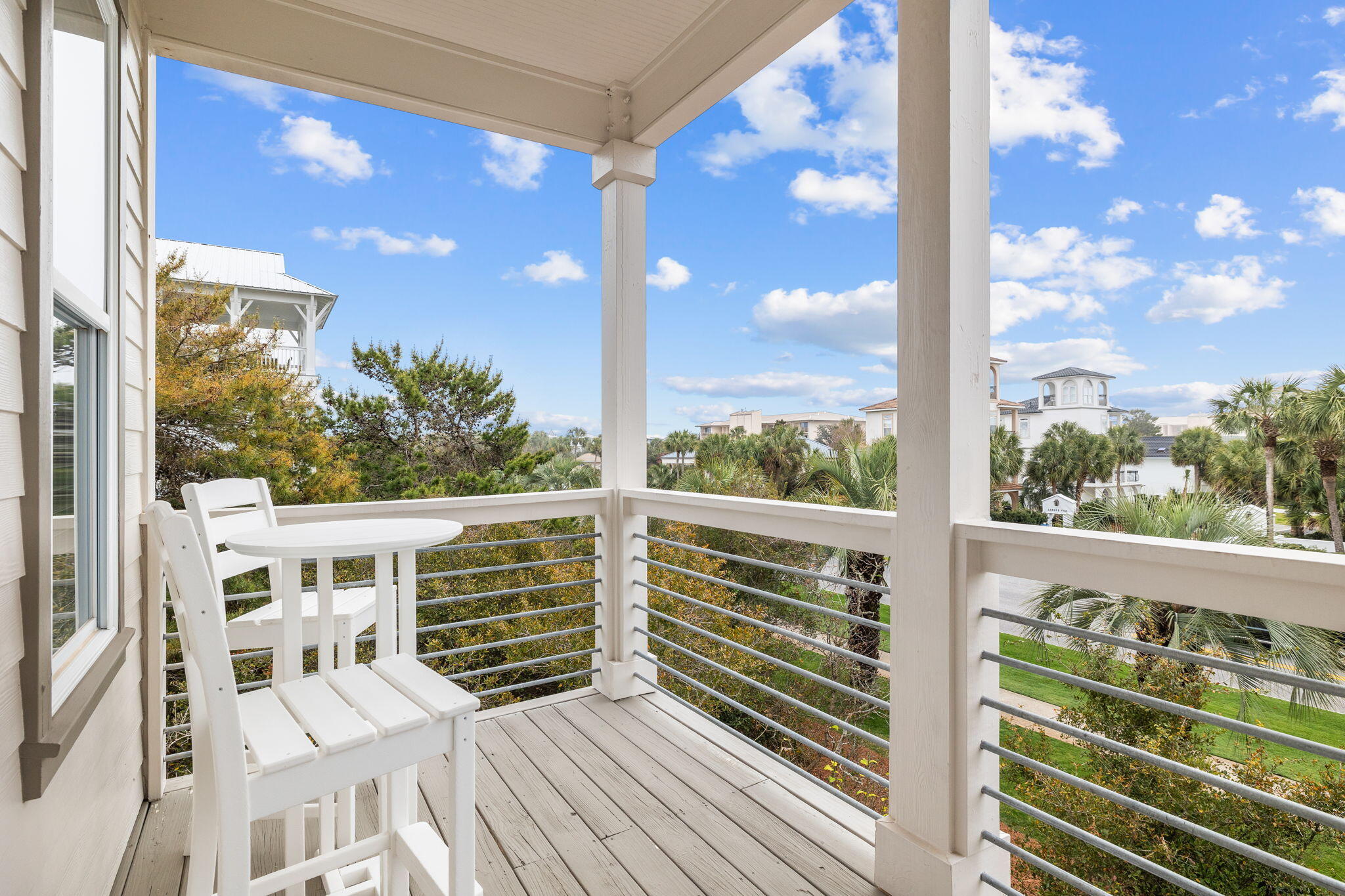 18 Trigger Trail East Inlet Beach, FL 32461 - Photo 12 of 44 a view of balcony with wooden floor and fence