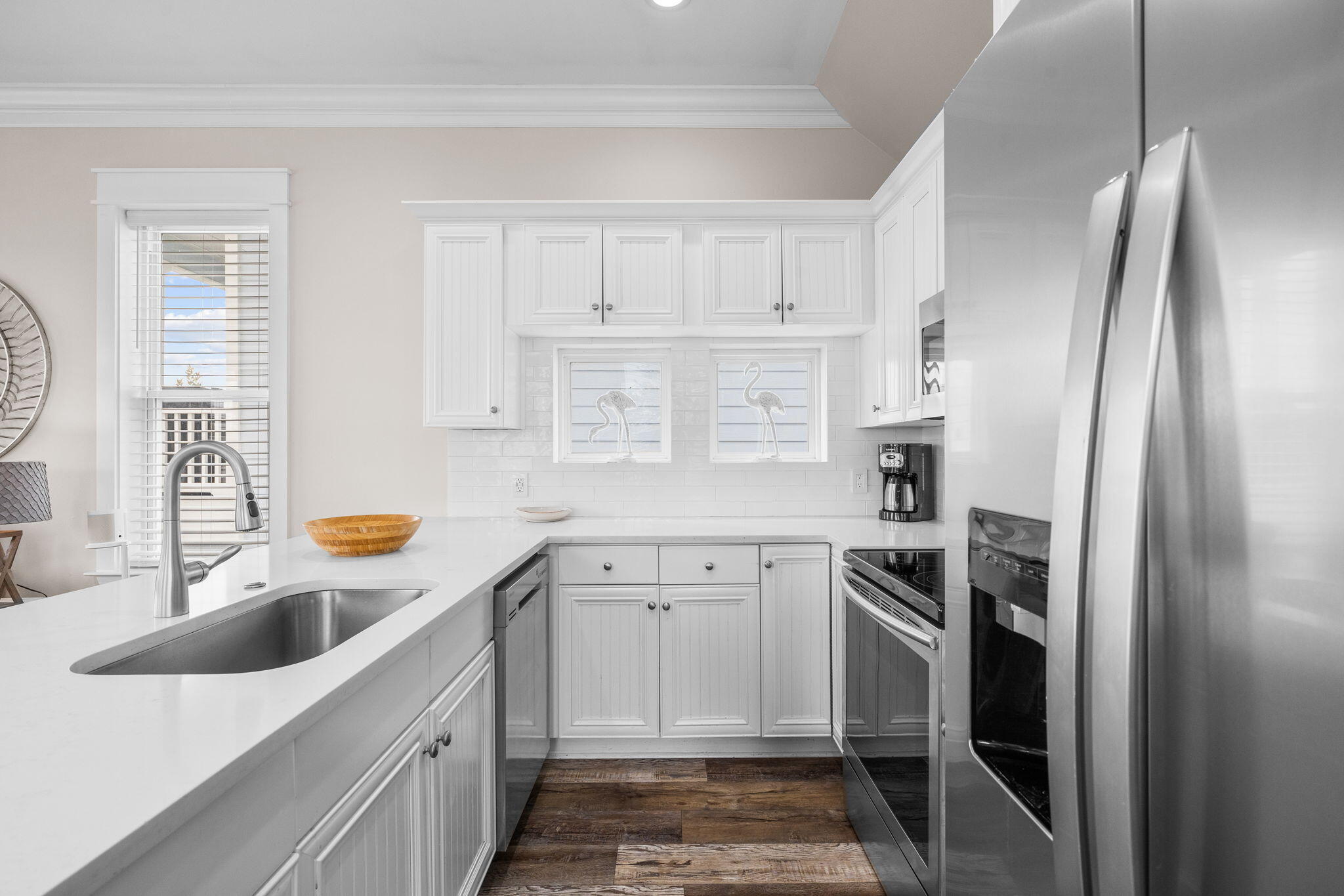 18 Trigger Trail East Inlet Beach, FL 32461 - Photo 18 of 44 a kitchen with white cabinets and a sink