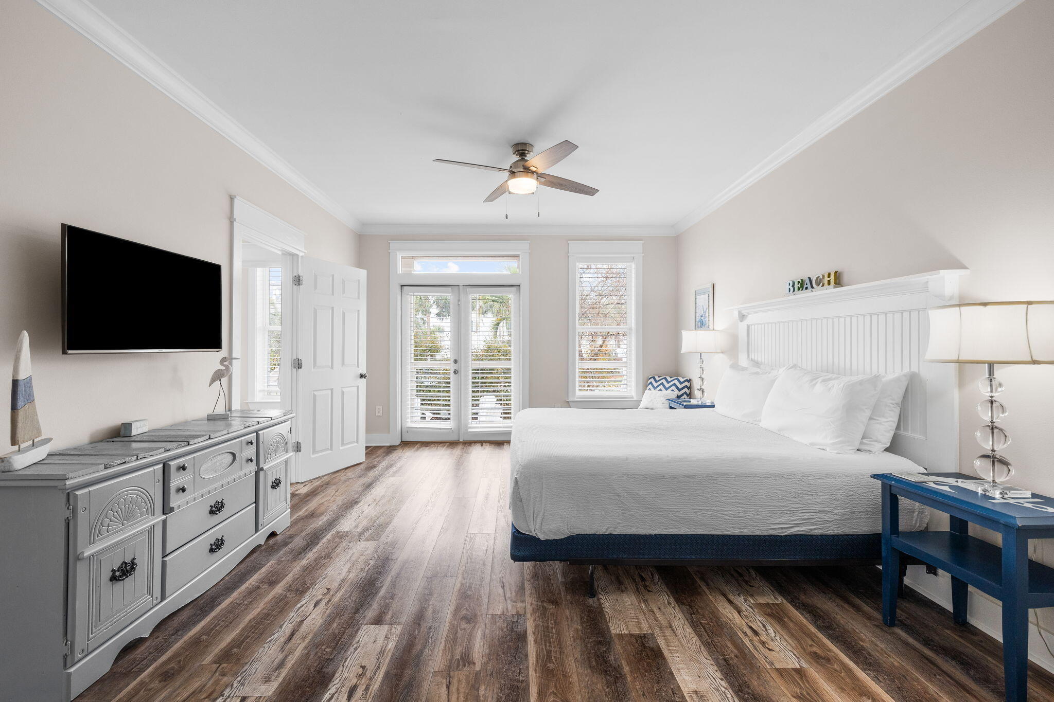 18 Trigger Trail East Inlet Beach, FL 32461 - Photo 20 of 44 a spacious bedroom with a bed and a flat screen tv
