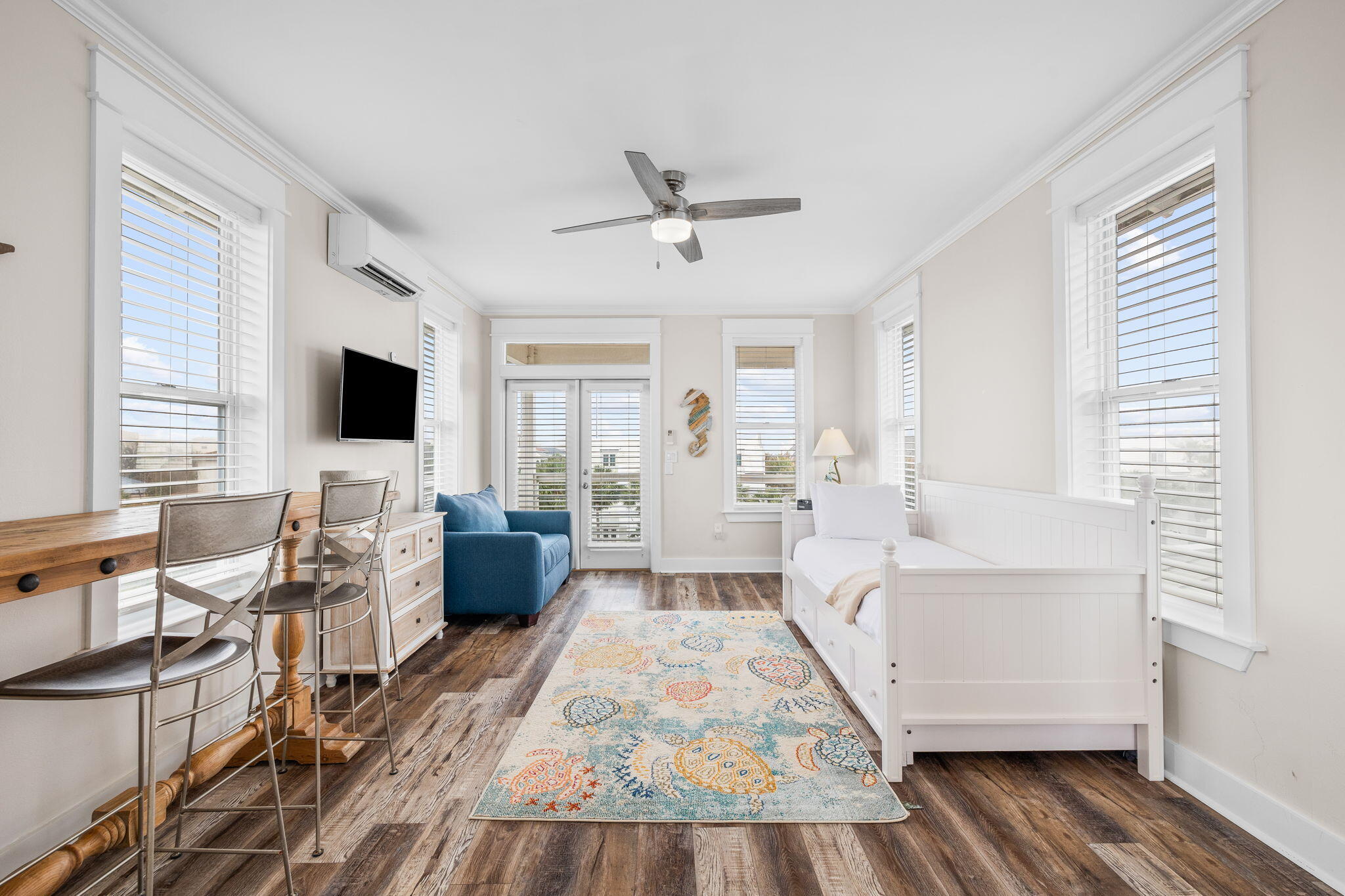 18 Trigger Trail East Inlet Beach, FL 32461 - Photo 34 of 44 a living room with furniture and a flat screen tv