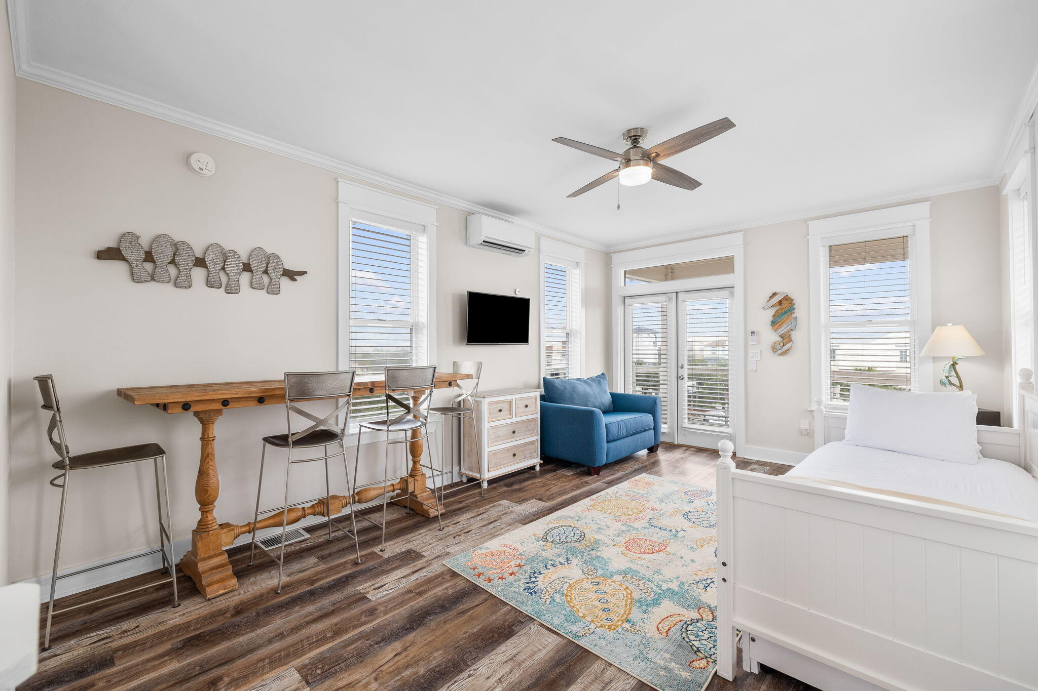 18 Trigger Trail East Inlet Beach, FL 32461 - Photo 35 of 44 a living room with furniture a flat screen tv and kitchen view