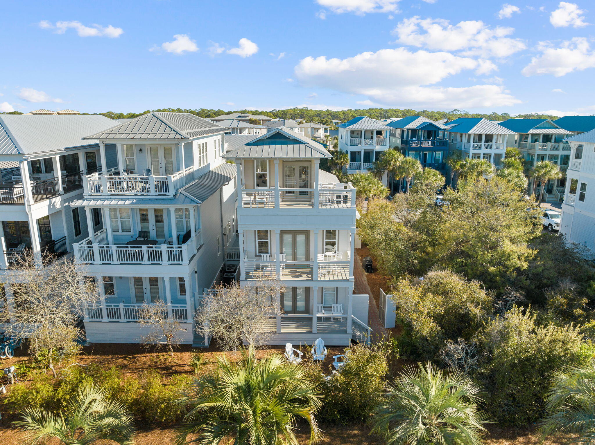 18 Trigger Trail East Inlet Beach, FL 32461 - Photo 5 of 44 a view of a large building with a lot of flower plants