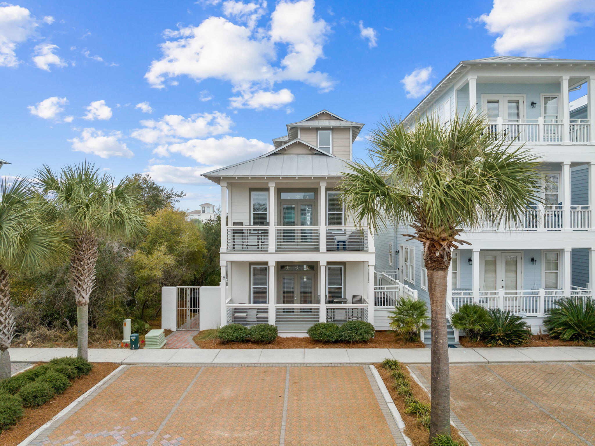 18 Trigger Trail East Inlet Beach, FL 32461 - Photo 9 of 44 a front view of a building with a yard