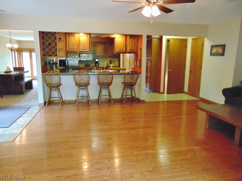 4273 Sherman Road Kent, OH 44240 - Photo 5 of 35 The family room flows into the kitchen, breakfast bar area and the dining room
