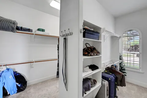 a view of hallway with washer and dryer