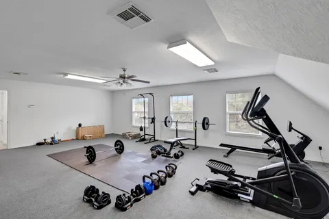 a view of a room with gym equipment