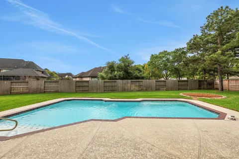 a view of an outdoor space with a swimming pool