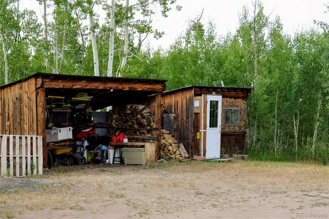 an outdoor space with seating and trees