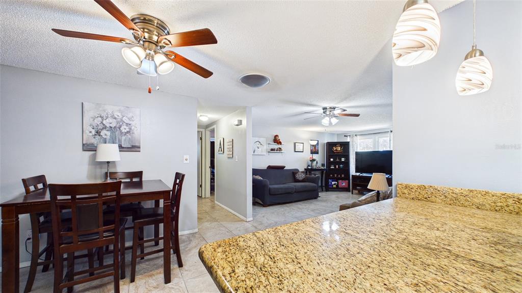 8840 Carmen Lane Port Richey, FL 34668 - Photo 17 of 49 a view of a dining room with furniture