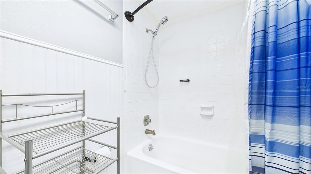 8840 Carmen Lane Port Richey, FL 34668 - Photo 29 of 49 a bathroom with a bathtub