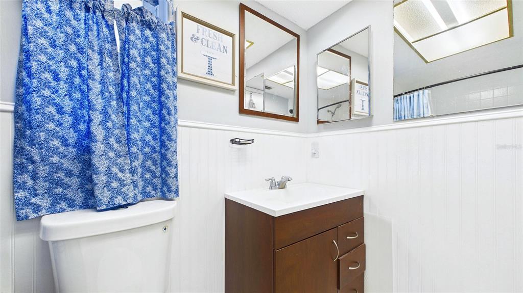 8840 Carmen Lane Port Richey, FL 34668 - Photo 30 of 49 a bathroom with a sink and a mirror