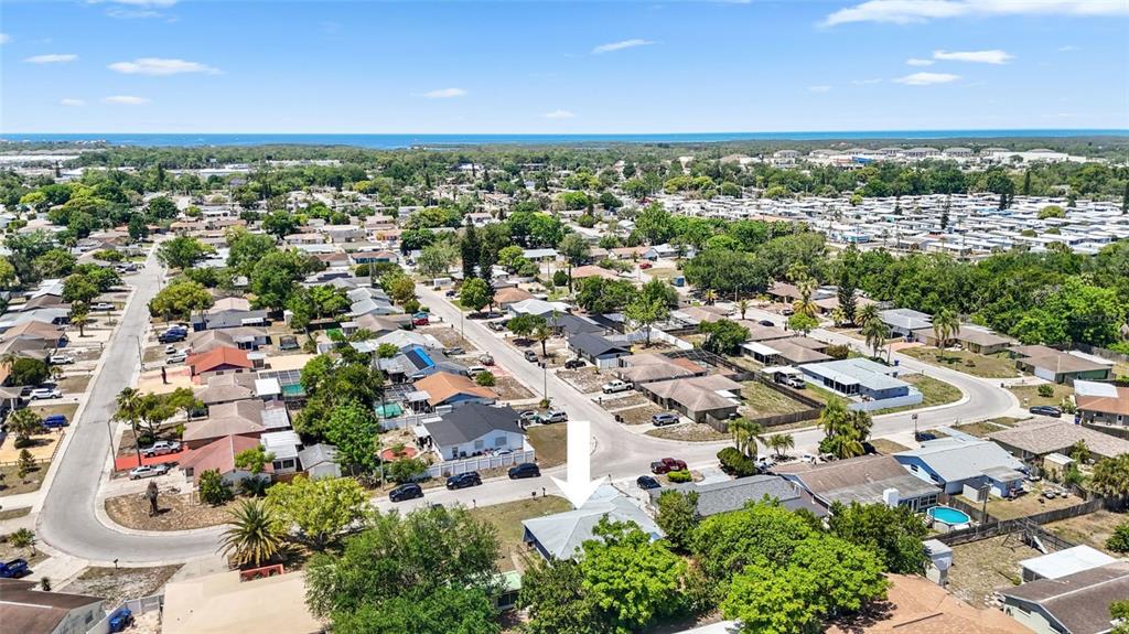 8840 Carmen Lane Port Richey, FL 34668 - Photo 45 of 49 an aerial view of a city with lots of residential buildings