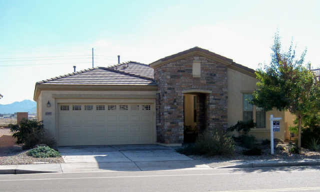 4309 East Ficus Way Gilbert, AZ 85298 - Photo 1 of 6 a front view of a house with a yard