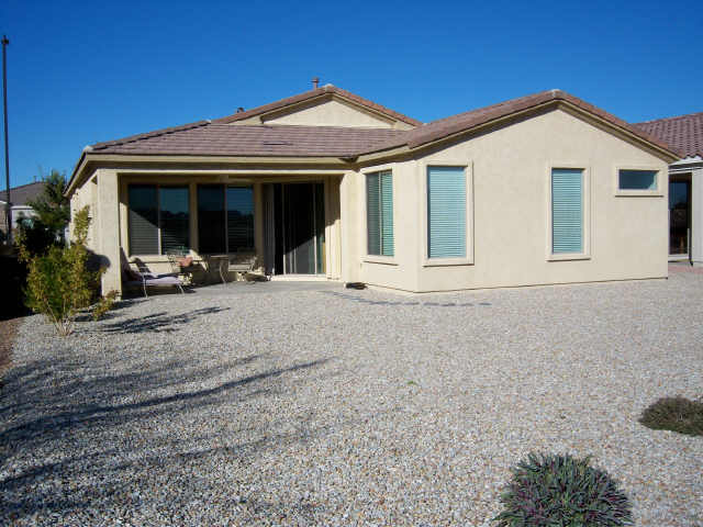 4309 East Ficus Way Gilbert, AZ 85298 - Photo 6 of 6 a front view of a house with a patio