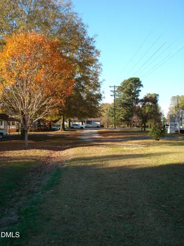 a view of a building with trees