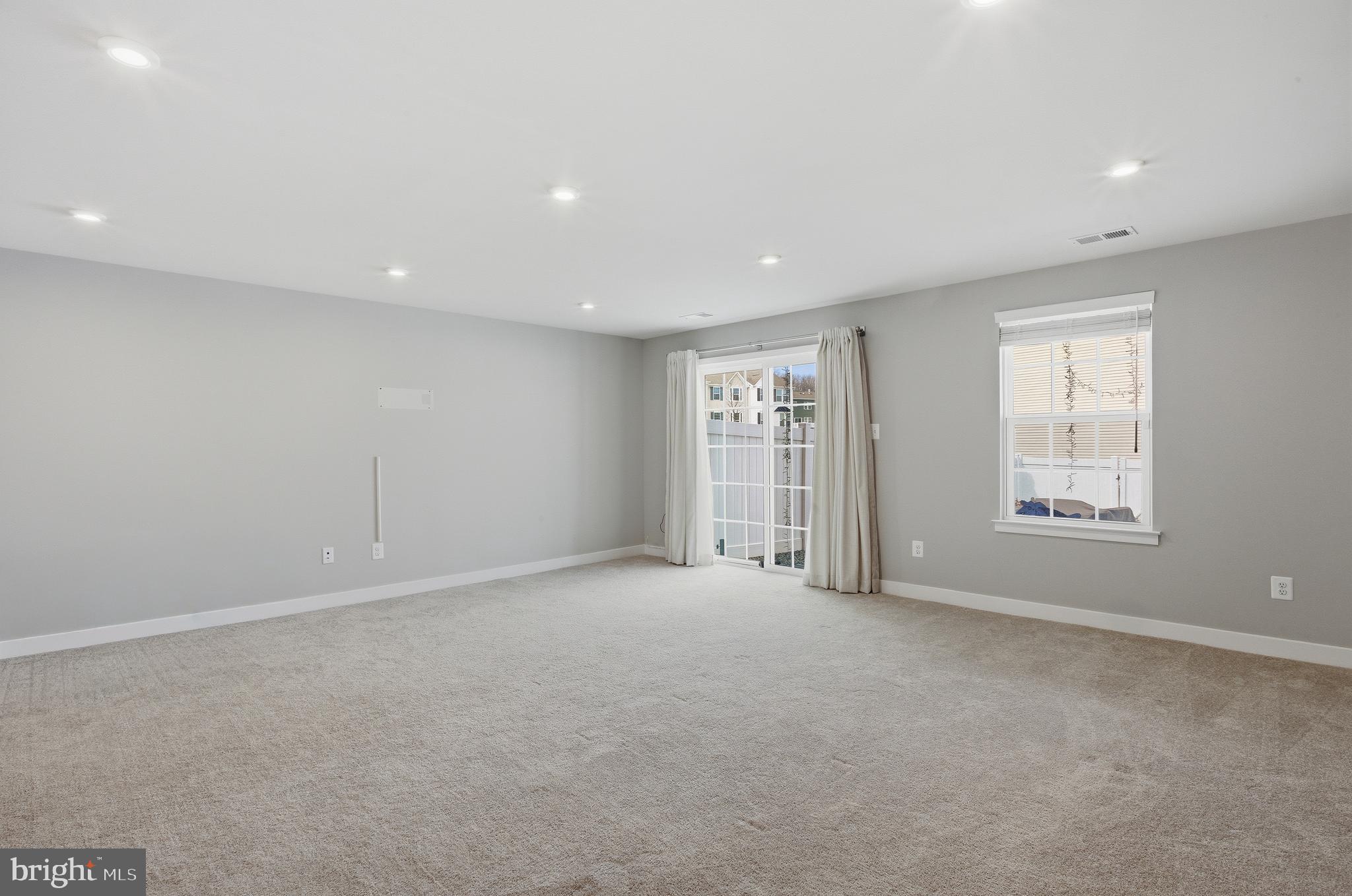 103 Freedom Way Sicklerville, NJ 08081 - Photo 16 of 43 an empty room with windows
