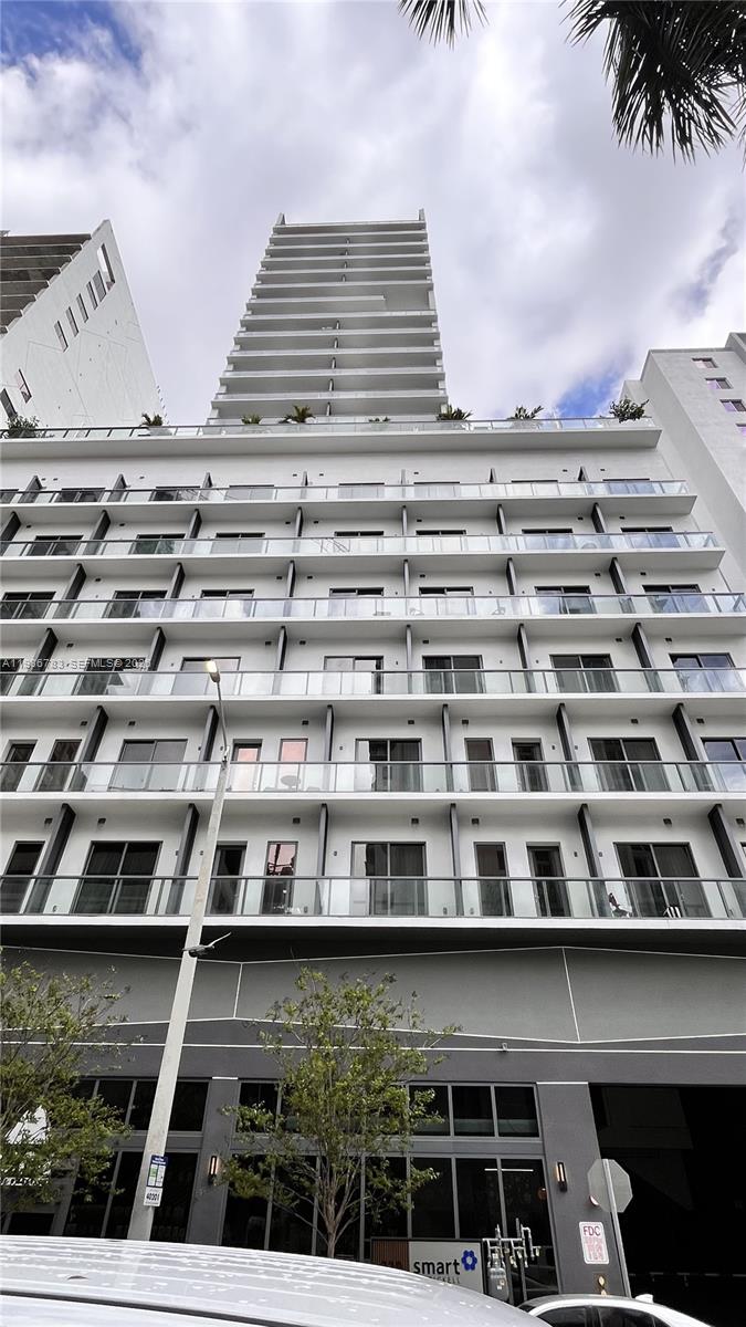229 Southwest 9th Street, Unit 307 Miami, FL 33130 - Photo 2 of 36 a front view of a multi story building