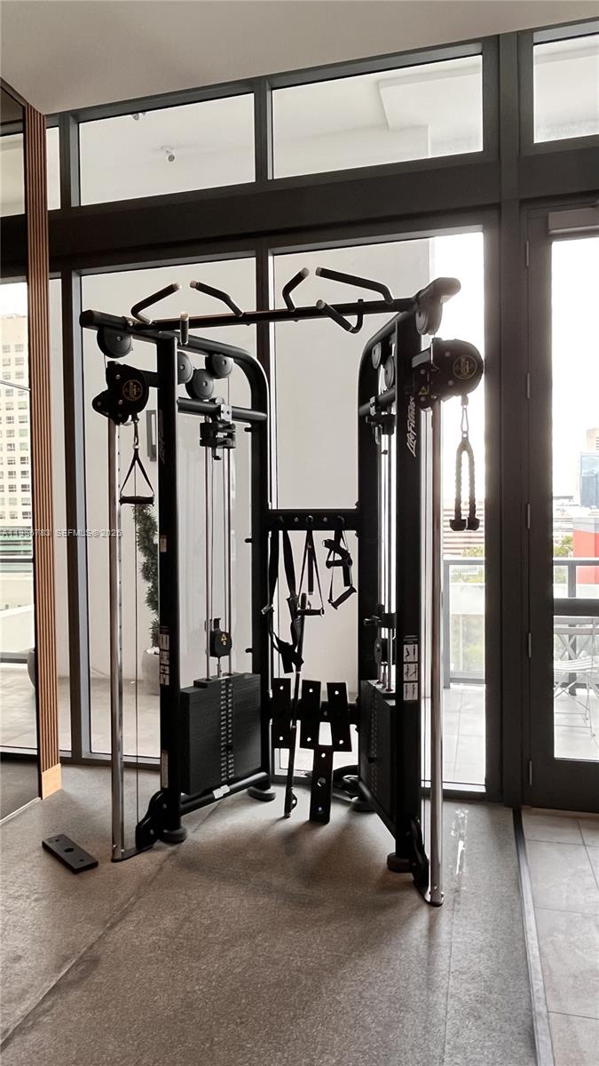 229 Southwest 9th Street, Unit 307 Miami, FL 33130 - Photo 24 of 36 a view of lobby with gym equipment