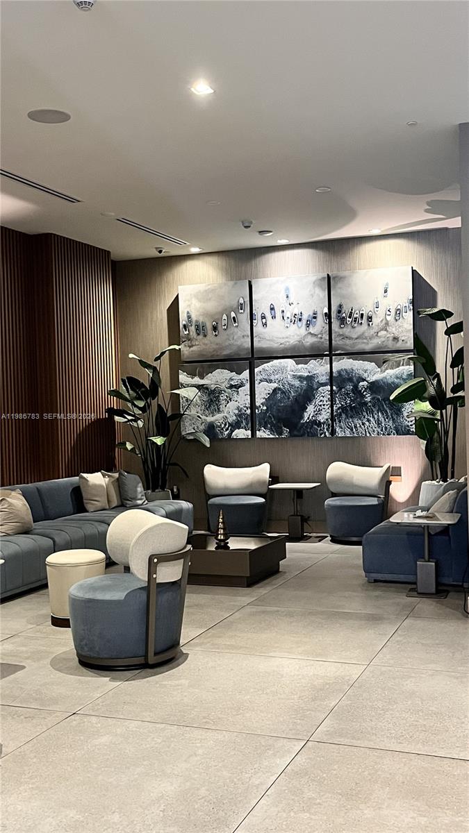 229 Southwest 9th Street, Unit 307 Miami, FL 33130 - Photo 30 of 36 a living room with furniture and lamp