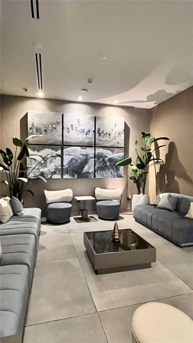 229 Southwest 9th Street, Unit 307 Miami, FL 33130 - Photo 31 of 36 a living room with furniture