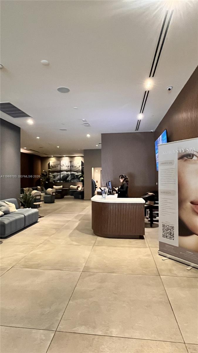 229 Southwest 9th Street, Unit 307 Miami, FL 33130 - Photo 32 of 36 a view of living room with furniture and a flat screen tv