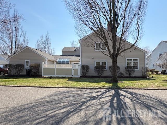 71B Winthrop Road Monroe Township, NJ 08831 - Photo 13 of 15 a view of a house with a big yard and large trees