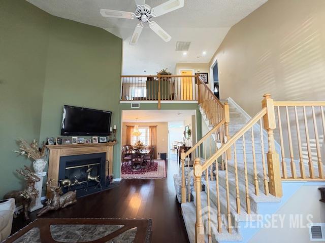 71B Winthrop Road Monroe Township, NJ 08831 - Photo 3 of 15 a living room with fireplace furniture and a flat screen tv
