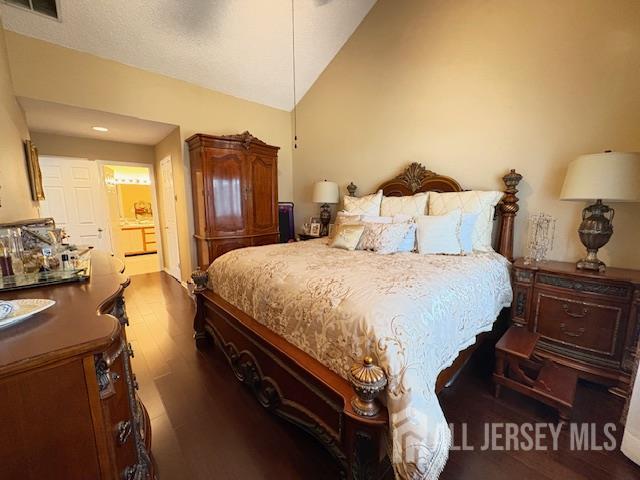 71B Winthrop Road Monroe Township, NJ 08831 - Photo 9 of 15 a bedroom with a bed and wooden floor