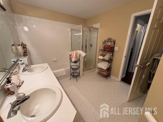 71B Winthrop Road Monroe Township, NJ 08831 - Photo 10 of 15 a bathroom with a sink and a mirror