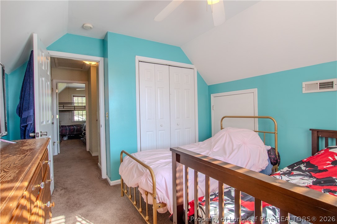 1629 Mattie Road Sanford, NC 27332 - Photo 16 of 29 a bedroom with furniture and a window