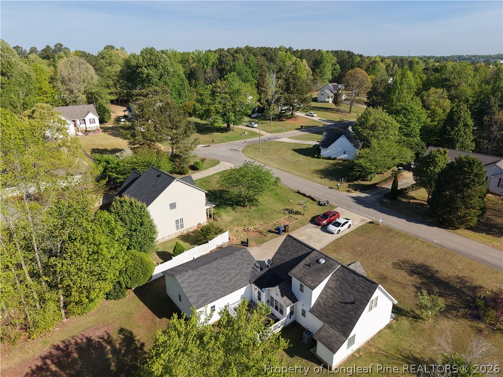 1629 Mattie Road Sanford, NC 27332 - Photo 23 of 29 an aerial view of a house with garden space and street view