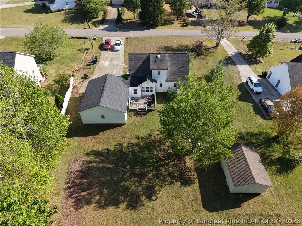 1629 Mattie Road Sanford, NC 27332 - Photo 25 of 29 an aerial view of a house with a yard