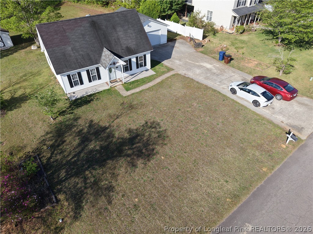 1629 Mattie Road Sanford, NC 27332 - Photo 27 of 29 an aerial view of a house with a yard and trees