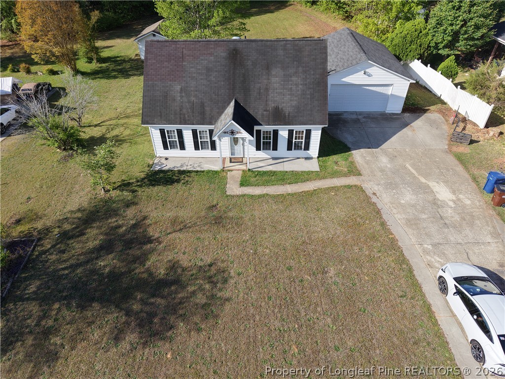 1629 Mattie Road Sanford, NC 27332 - Photo 29 of 29 an aerial view of a house with swimming pool