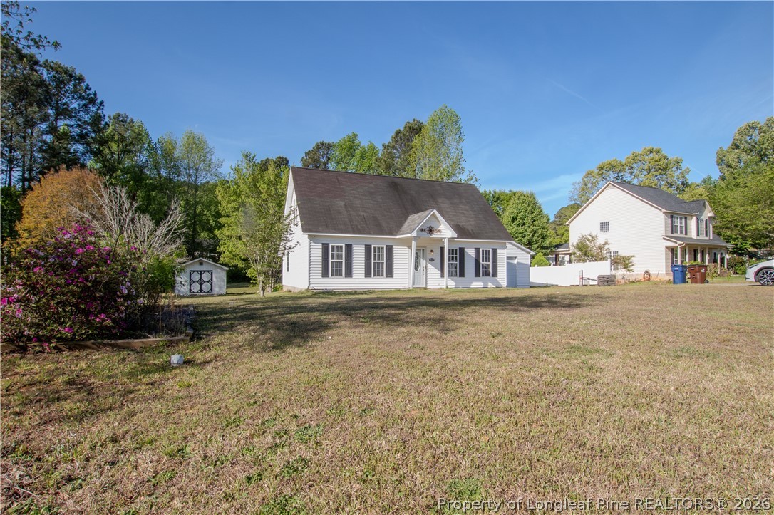 1629 Mattie Road Sanford, NC 27332 - Photo 4 of 29 a view of house with outdoor space and sitting area