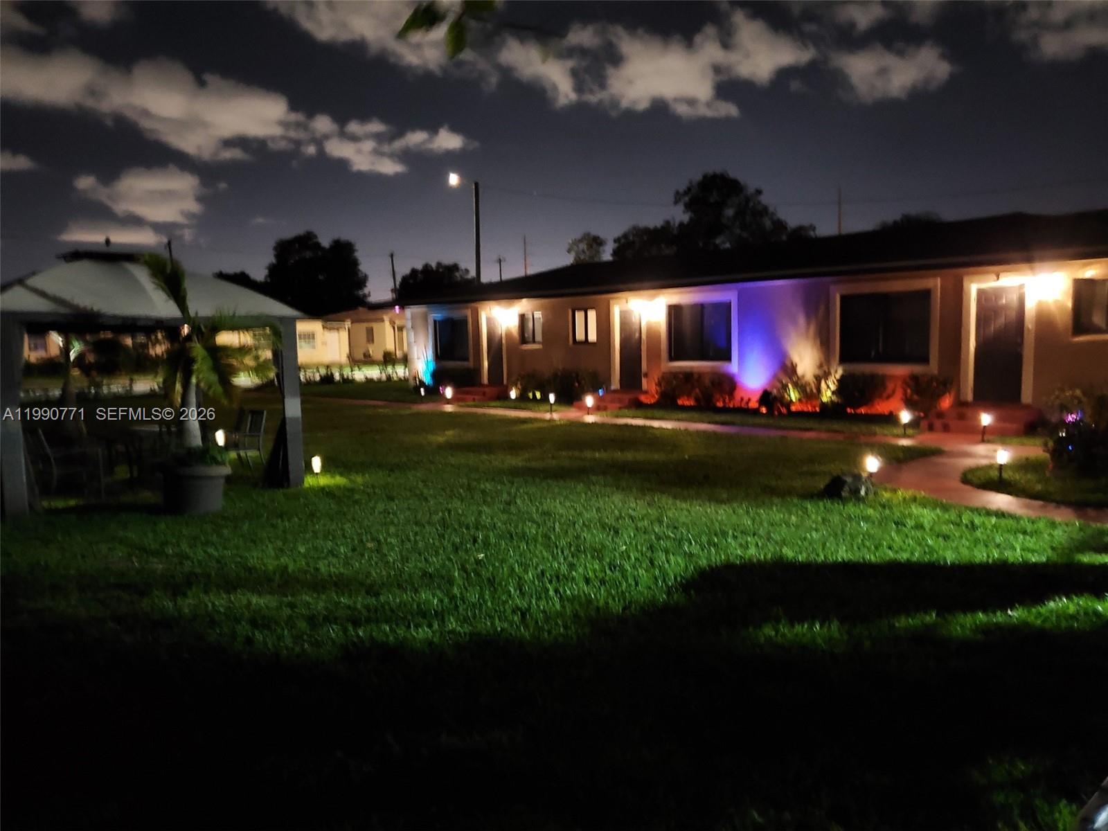 2015 Funston Street, Unit 2 Hollywood, FL 33020 - Photo 18 of 19 a view of a yard in front of house