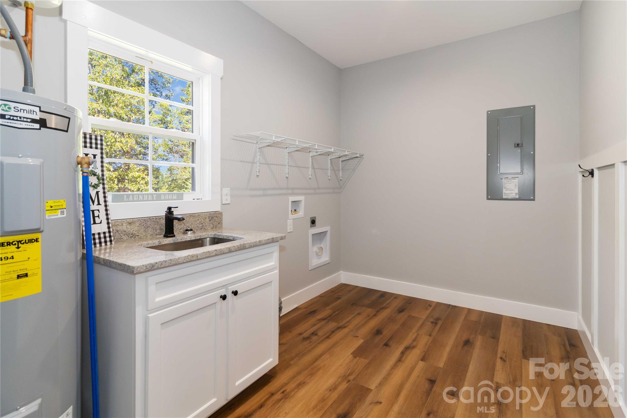 2605 Mt Prospect Road Chester, SC 29706 - Photo 16 of 35 a view of a kitchen with wooden floor and electronic appliances