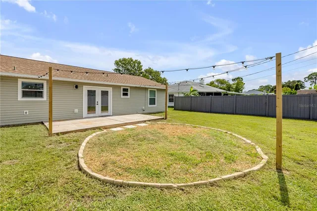 a view of a swimming pool with a patio