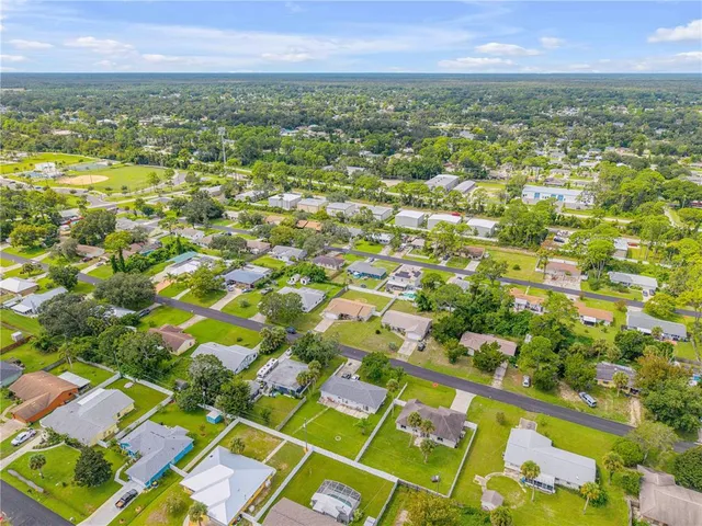 a view of city with tall buildings