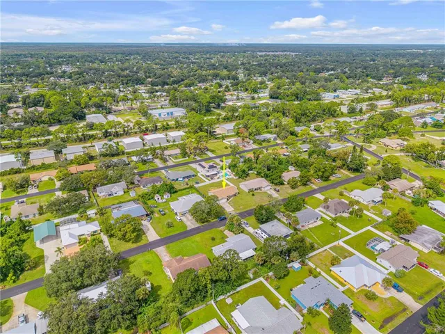 a view of city with ocean