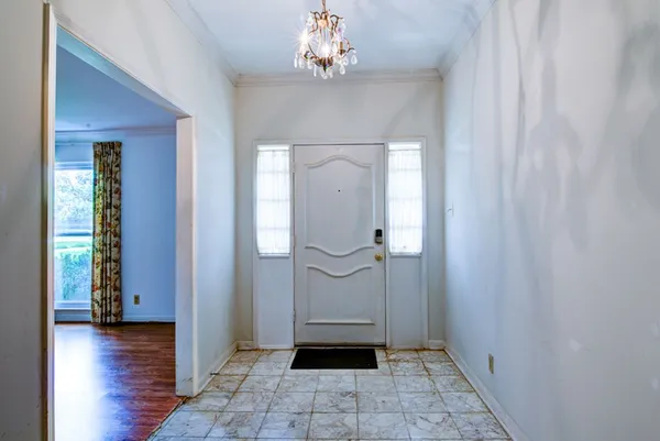 a view of a livingroom with wooden floor