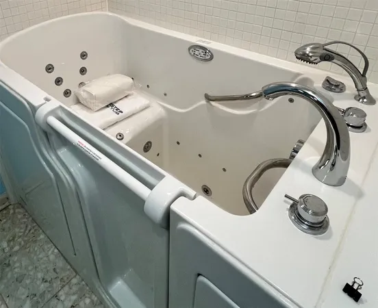 a backyard of a house with lots of green space and lake view