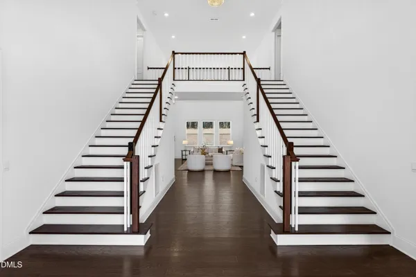 a view of an entryway with wooden floor