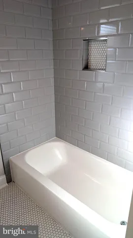 a bathroom with a bathtub