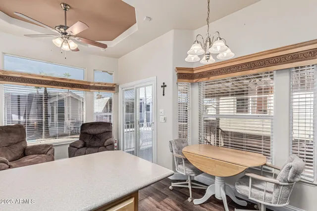 a kitchen with a stove a sink and a refrigerator