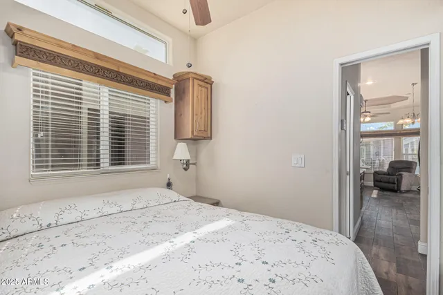 a view of a dining room with furniture wooden floor and chandelier