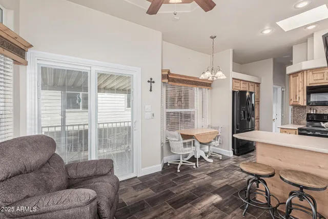 a picture of a bench in front of a wall